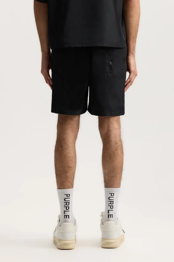 Badshorts med kontur av logotyp
