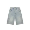 P070 Shorts med präglat monogram